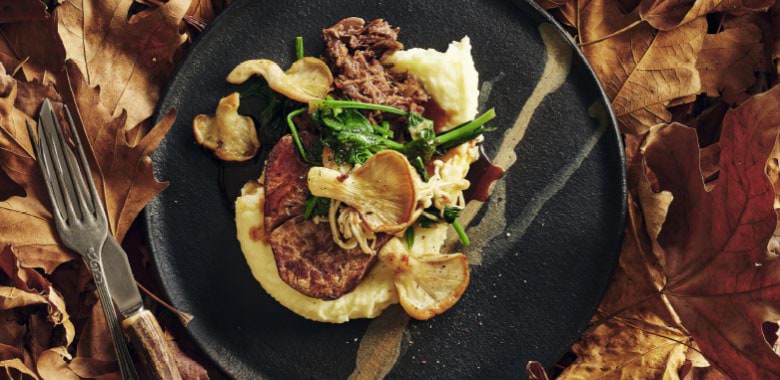 Beef tenderloin with oxtail, potato puree, spinach, mushrooms and jus