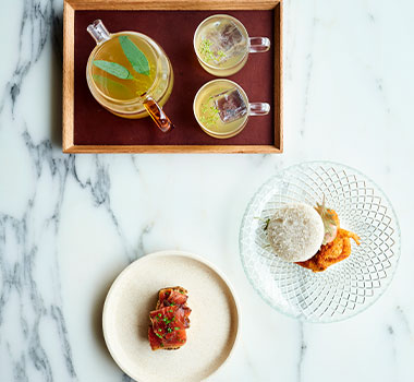 James Viles' iced bush tea (top), ocean trout pastrami with ranch and seed cake (left), and school prawn katsu, bonito mayo and pickled turnip (right).