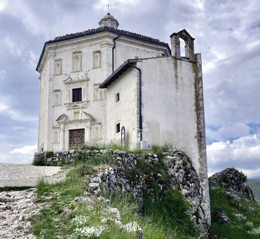Chiesa di Santa Maria della Pieta, a Renaissance-era church, perched in the hillsides of Abruzzo (Credit: Rocca Calascio).