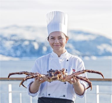 Freshly caught seafood is cooked by chefs on board Hurtigruten's boats