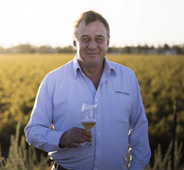 Darren De Bortoli drinking a glass of Noble Botrytis Wine