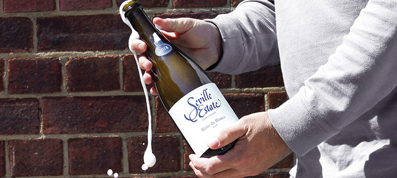 Popping the cork on a Seville Estate Blanc de Blancs sparkling wine