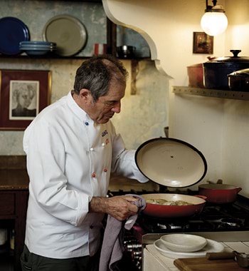 Gabriel Gaté at the stovetop preparing a dish