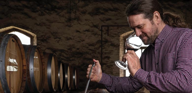 Château Tanunda’s Jeremy Ottawa samples a developing red.