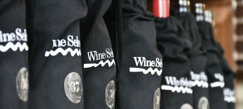 Bottle of Australian Merlot in blind tasting bags