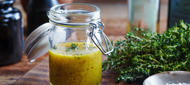 Orange, thyme and mustard dressing with Moro olive oil and vinegar