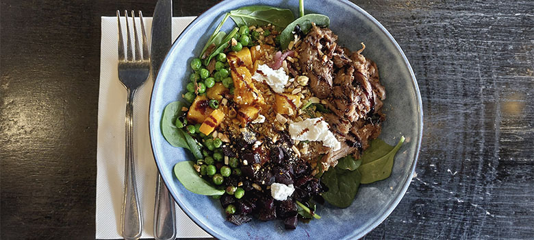 Braised lamb bowl with roast pumpkin, balsamic beetroot, goats cheese, macadamia, pickled onion, minted peas, dukkha, mixed leaves and balsamic glaze at Son of a Gun
