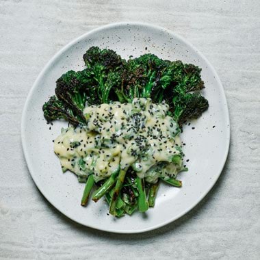 Adam D'Sylva's Charred broccolini with white miso hollandaise 