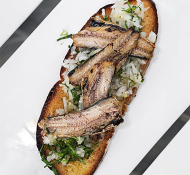 Tiborna Open Toast Sandwich Tapas With Sardine And Onion garlic.